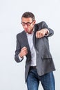 Playful businessman showing his boxing hands for fun competition