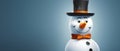 A snowman wearing a hat and bow tie