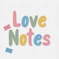 Sweet pastel colored text spelling love notes with cute little envelopes on a white background Royalty Free Stock Photo