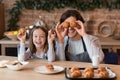 Playful Dad And His Little Daughter Fooling While Baking In Kicthen Together