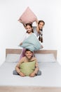 playful girls in pajamas having pillow Royalty Free Stock Photo