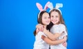 Playful girls sisters celebrate easter. Spring holiday. Happy childhood. Friendship concept. Easter vibes. Happy easter Royalty Free Stock Photo