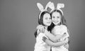 Playful girls sisters celebrate easter. Spring holiday. Happy childhood. Friendship concept. Easter vibes. Happy easter Royalty Free Stock Photo