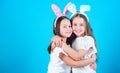 Playful girls sisters celebrate easter. Spring holiday. Happy childhood. Friendship concept. Easter vibes. Happy easter Royalty Free Stock Photo