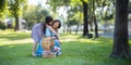 Playful Grandma spending time with his granddaughter in park on sunny day happily. concept grandparent and grandchild Royalty Free Stock Photo