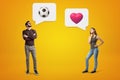 Man and woman pondering love and soccer topics Royalty Free Stock Photo