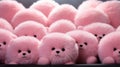 A group of pink stuffed animals