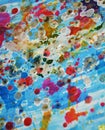 Playful pink blue gold violet wax splashes, paint abstract creative background