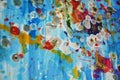 Playful pink blue gold wax splashes, paint abstract creative background