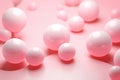 Playful pink spheres arranged on a harmonizing pink backdrop