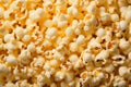 Playful popcorn display a background showcases the crunchy delight of popped kernels