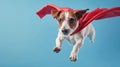 Playful puppy in superhero outfit flying in blue space, funny comic canine in action