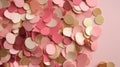 Blush colored confetti on pink background