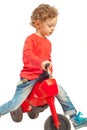 Playful toddler with bike Royalty Free Stock Photo