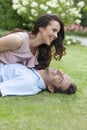 Playful young couple having leisure time in park Royalty Free Stock Photo