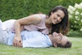 Playful young couple having leisure time in park Royalty Free Stock Photo