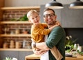 Playful young father and son having fun together at home Royalty Free Stock Photo