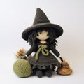 Playfully Dark Crochet Witch With Green Yarn