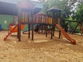 Playground for children with lots of slides, swings. Royalty Free Stock Photo