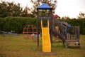 Playground for children in the yard of the primary school in the village Royalty Free Stock Photo