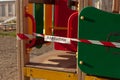 The Playground is closed for quarantine. Slides and swings are covered with protective tape