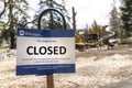 Playground Closed Sign Due to Coronavirus Covid-19 Pandemic Virus Contamination and Risk of Viral Spread