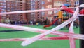 The playground is closed by a striped red and white tape fencing for quarantine during the coronavirus epidemic,COVID-19,nCov-19 Royalty Free Stock Photo