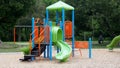 Playground with a colorful fun slide Royalty Free Stock Photo