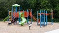 Playground with a colorful fun slide Royalty Free Stock Photo