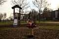 Playground with equipments wrapped in red and white tape to prevent usage during the Covid pandemic