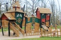 A wooden outdoor playground for kids in Luxembourg for kids to have fun and play outside