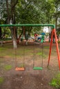 Playground in an open-air park, there are slides