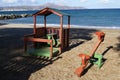 Playground seesaw and summerhouse