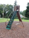 Playground slide using metal and plastic Royalty Free Stock Photo