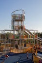 A playground with slides in a park Royalty Free Stock Photo