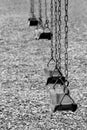 Playground swings in black and white