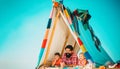 Playhouse for kids located at roof and having beautiful view at sky. Funny summer holidays with family. Loving dad takes Royalty Free Stock Photo