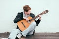 Playing acoustic guitar Royalty Free Stock Photo