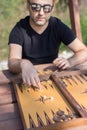 Relaxing with playing backgammon Royalty Free Stock Photo