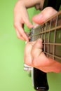 PLAYING THE BASS GUITAR Royalty Free Stock Photo