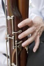 Playing on a bassoon Royalty Free Stock Photo