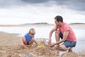 Playing on the beach with dad