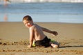Playing in beach sand Royalty Free Stock Photo