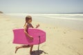 Playing at the beach on summer vacation Royalty Free Stock Photo