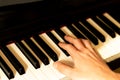 Playing beautiful piano sound on the piano keys