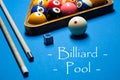 Playing billiard. Billiards balls and cue on billiards table. Bi