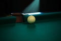 Playing billiard. Billiards balls and cue on green billiards table. Billiard sport concept. Pool billiard game. Russian pyramid Royalty Free Stock Photo