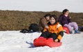 Playing with bob on the snow in the mountains in winter Royalty Free Stock Photo