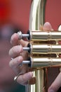 Playing Brass wind instrument