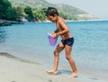 Playing with bucket of water